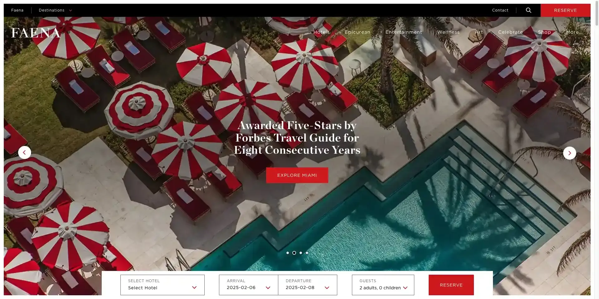 Faena homepage with an aerial view of a pool lined with red and white umbrellas.